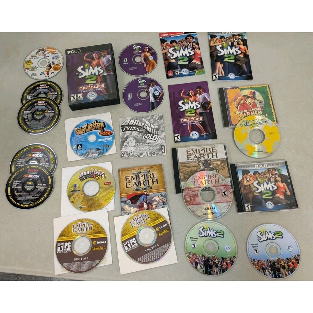 Vintage 10 PC Game Lot Sims Roller Coaster Tycoon Empire Earth Carmen Sandiego